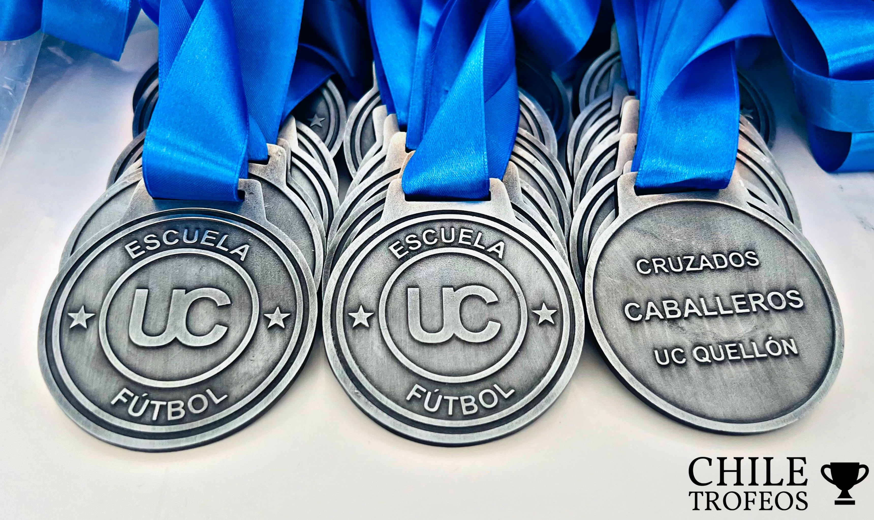 Medallas natación plata Escuela cintas azules
